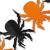 Orange-schwarze Papiergirlande mit Spinnenmotiven für die Halloween Partydeko.
